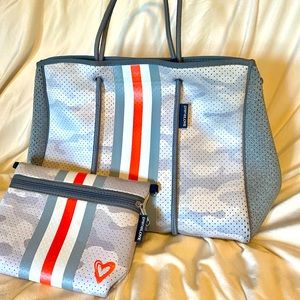 EUC Neoprene camo tote with wristlet. No stains.